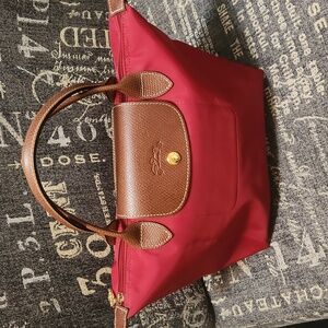 Red Longchamp bag with brown leather